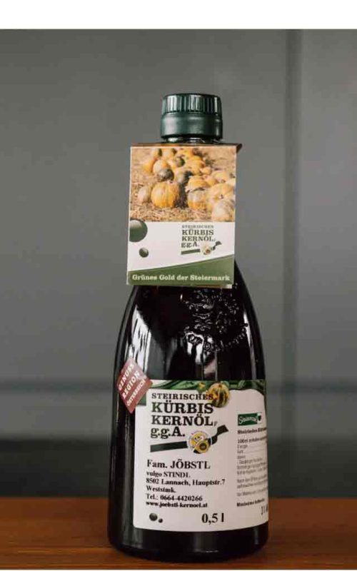 Græskarkerneolie i glasflaske